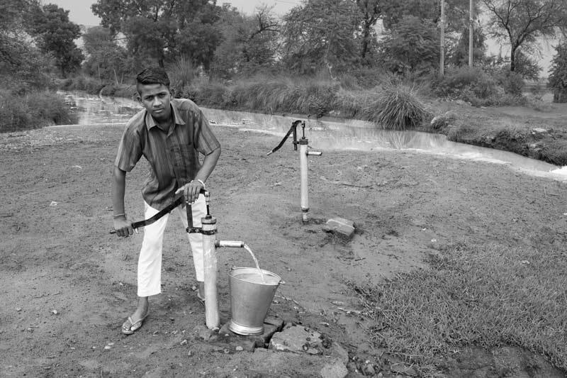 Integrated Solution for Rural Drinking Water Challenges - Collecting safe drinking water from a handpump recharged by irrigation canals in Fazilka district, Punjab